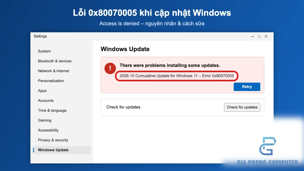 Máy tính Windows đặt trên bàn kỹ thuật với cửa sổ cập nhật hệ thống đang mở